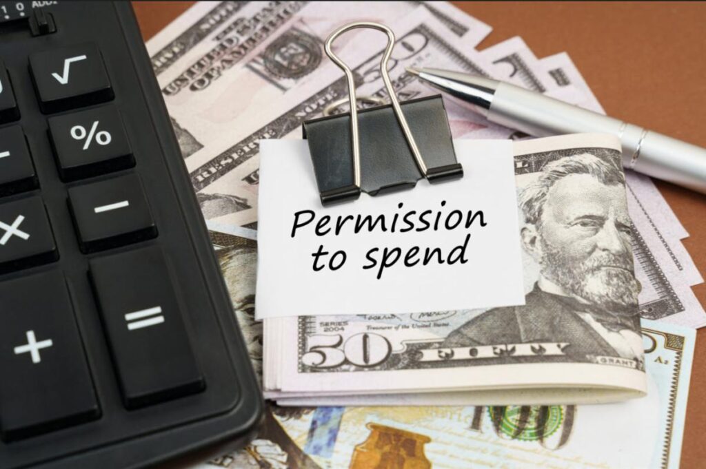 Permission to spend text is shown over dollar notes