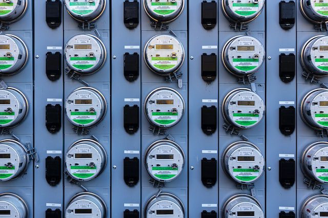 Electric meters arranged in a grid pattern.