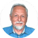 Smiling older man in blue shirt portrait