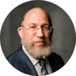 Bearded man portrait wearing glasses and suit