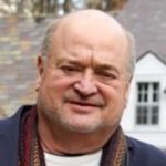 Portrait of smiling older bald man